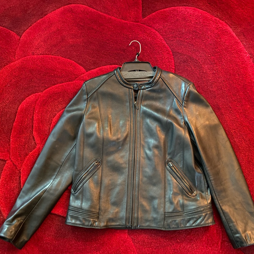 Like new Cole Haan black leather zip jacket.